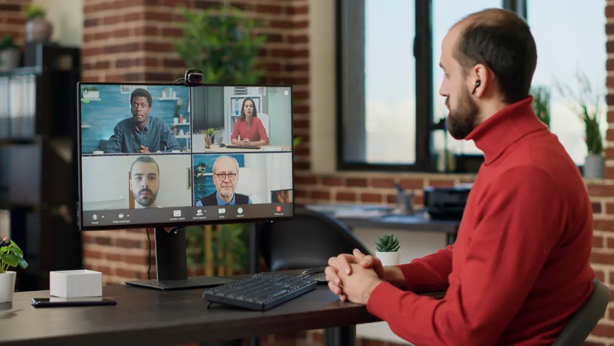 remote developer on a video call with team