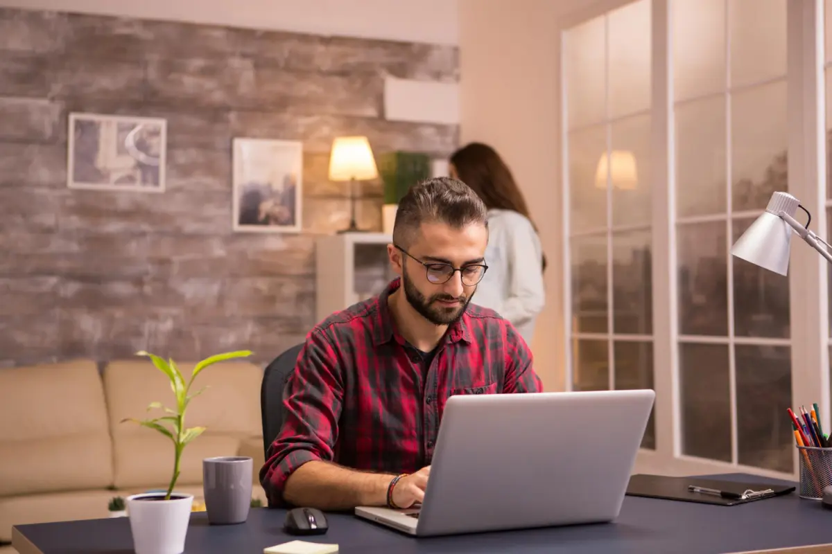 synergy sparq developer working on laptop